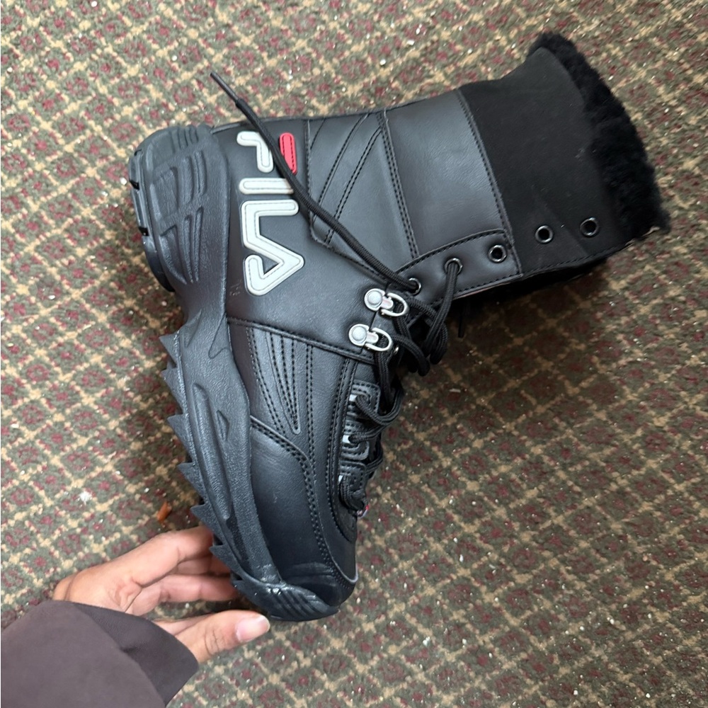 Woman’s Fila Black High-Top Boots